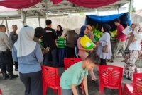 Gerakan pangan murah,Polresta Pekanbaru di Polsek Binawidya diserbu warga, 2 Ton beras ludes seketika