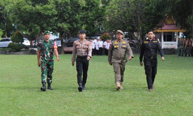 Kapolresta Pekanbaru Tegaskan Kesiapsiagaan Hadapi Banjir dan P2KS dalam Apel Gabungan Tahun 2025
